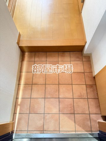 メゾンカスガの玄関