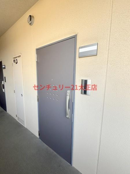 大阪市港区市岡元町１丁目の賃貸マンションの玄関