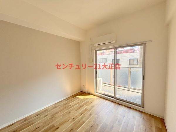 大阪市港区市岡元町１丁目の賃貸マンションの洋室