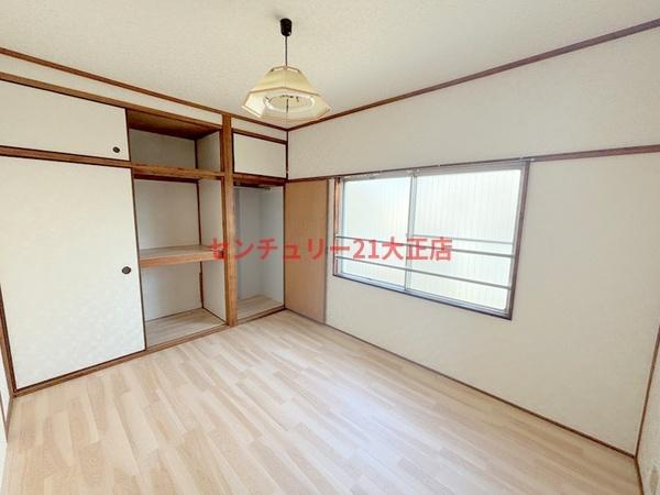 大阪市港区市岡元町２丁目の賃貸マンションの洋室