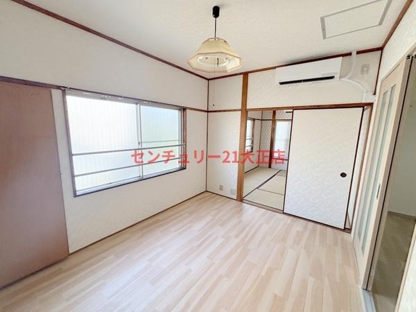 大阪市港区市岡元町２丁目の賃貸マンションの洋室