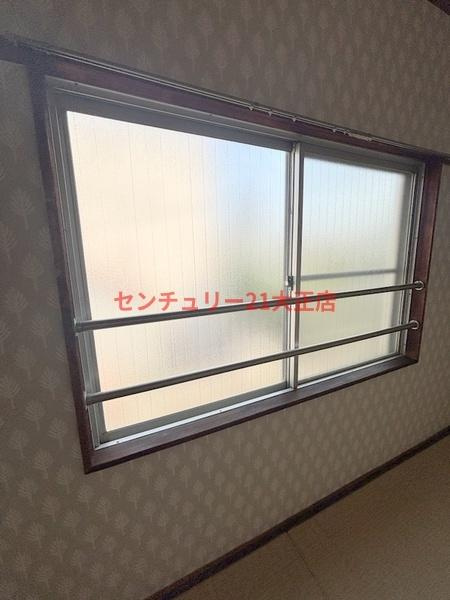 大阪市港区市岡元町２丁目の賃貸マンションの洋室