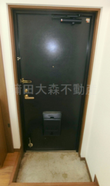 マンションＨＫＭの玄関