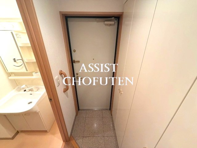 ベェルヴェル稲城の玄関