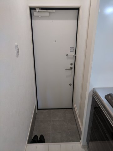 ウラノス小松川の玄関