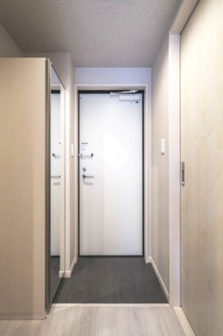 Ｍ’ｓ　アパートメントの玄関