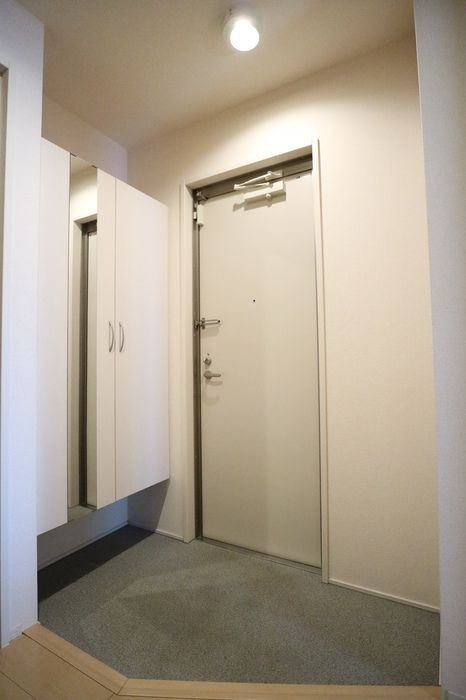 グランソレイユ南多聞台の玄関