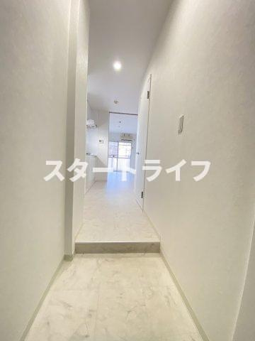 大阪市淀川区十三元今里１丁目の賃貸マンションの玄関
