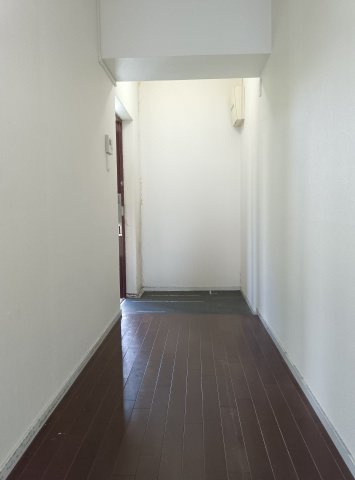神戸市東灘区岡本７丁目の賃貸マンションの玄関