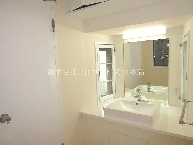 神戸市東灘区西岡本５丁目の賃貸マンションの洗面所