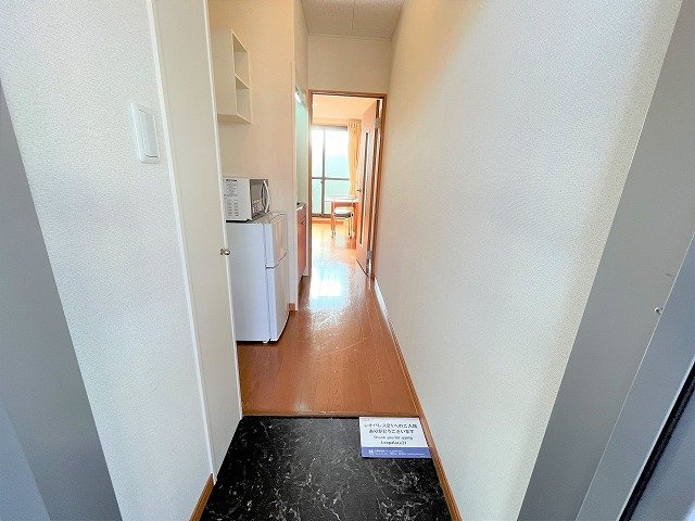 レオパレスコンフォート光明池の玄関
