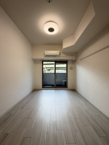 プレサンスOSAKA DOMECITY クロスティの居間・リビング
