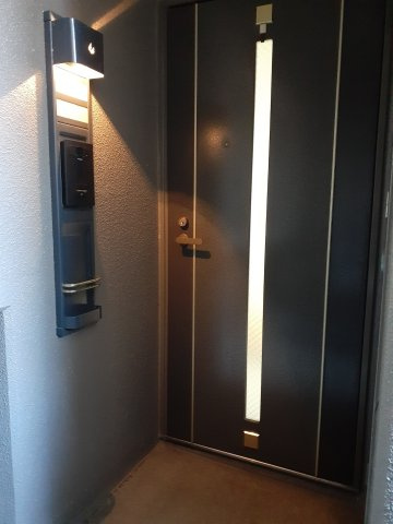コアマンションネクステージ古城堀端公園の玄関
