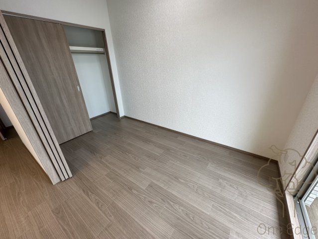 プレジオ塚本ASIANの寝室