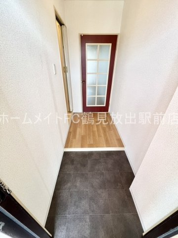 大阪市鶴見区放出東１丁目の賃貸マンションの玄関