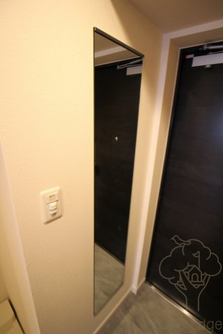 プレサンス梅田東グラッドの玄関