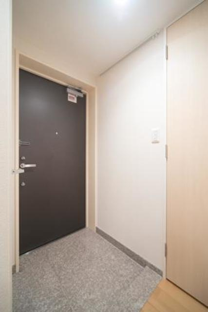 ユニゾンタワーの玄関|※写真は同タイプ住戸です。