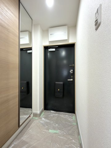 呉中央コープマンションの玄関|天井髙のシューズボックスがります。