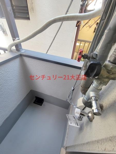 ポートワンの洗面所|バルコニーに洗濯機置場