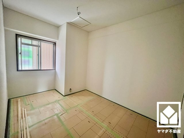 ユニ宇治小倉マンションの洋室