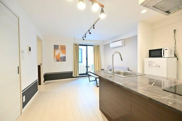 Ａｐａｒｔｍｅｎｔ小石川後楽園の居間・リビング