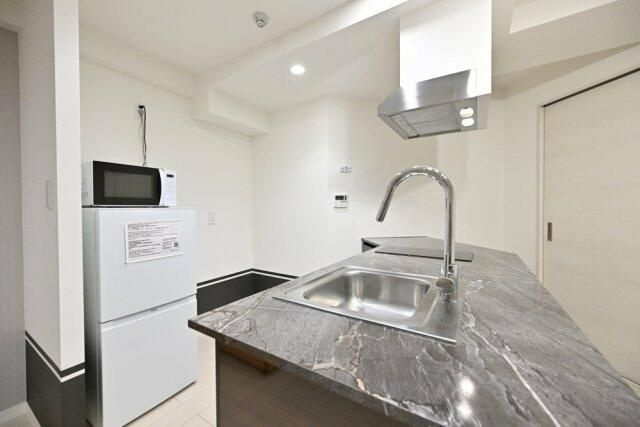 Ａｐａｒｔｍｅｎｔ小石川後楽園のキッチン