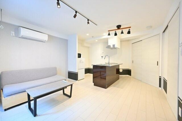 Ａｐａｒｔｍｅｎｔ小石川後楽園の居間・リビング