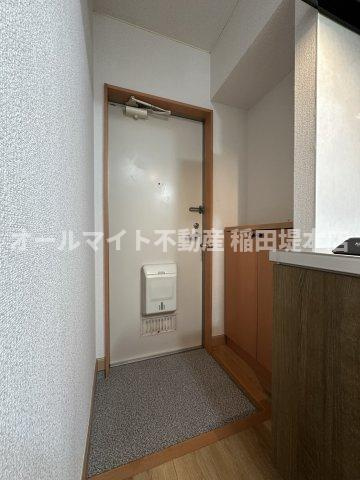 川崎市多摩区宿河原６丁目のアパートの玄関