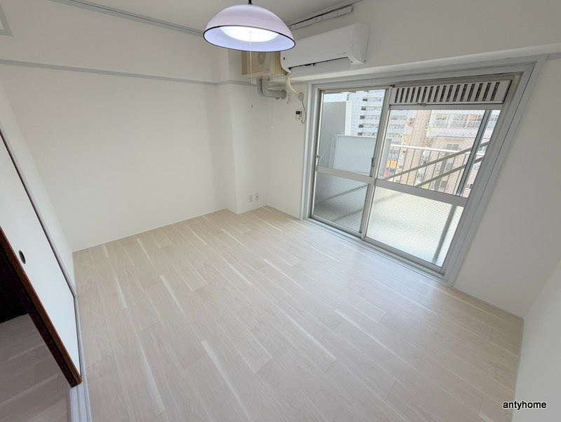 新大阪第一ダイヤモンドマンション　仲介手数料無料の寝室
