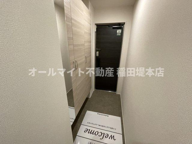 川崎市多摩区中野島５丁目のアパートの玄関