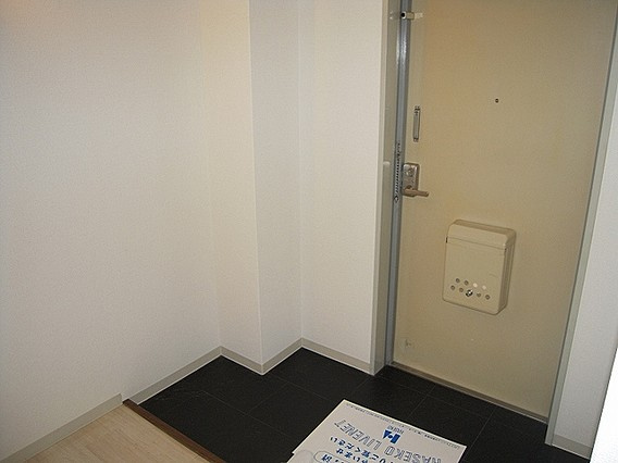 神戸市灘区深田町３丁目の賃貸マンションの玄関