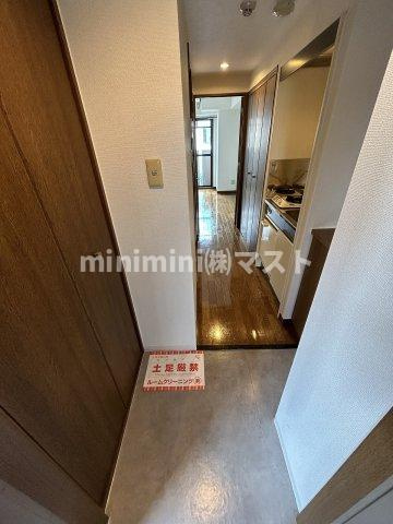 大阪市西区本田４丁目の賃貸マンションの玄関
