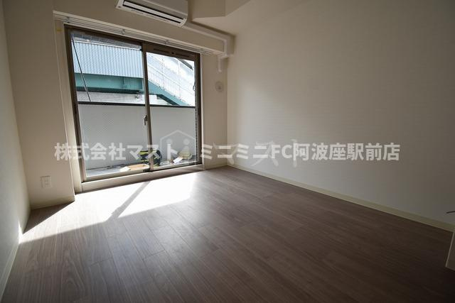大阪市西区九条２丁目の賃貸マンションの居間・リビング