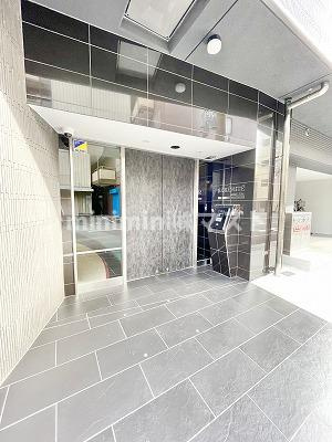 大阪市西区九条南３丁目の賃貸マンションのエントランス