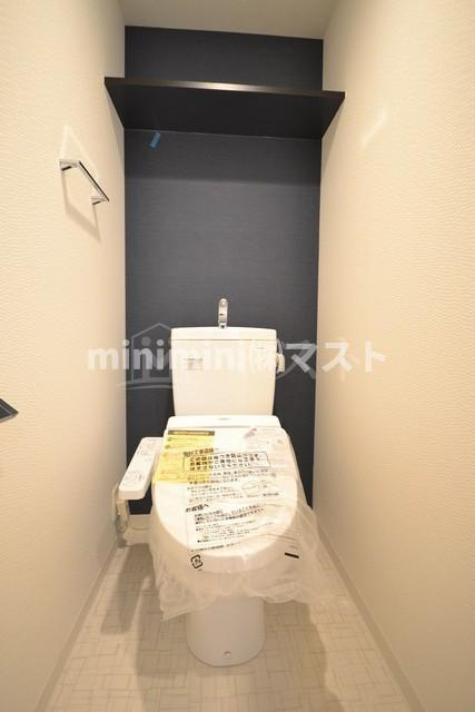 大阪市西区本田１丁目の賃貸マンションのトイレ