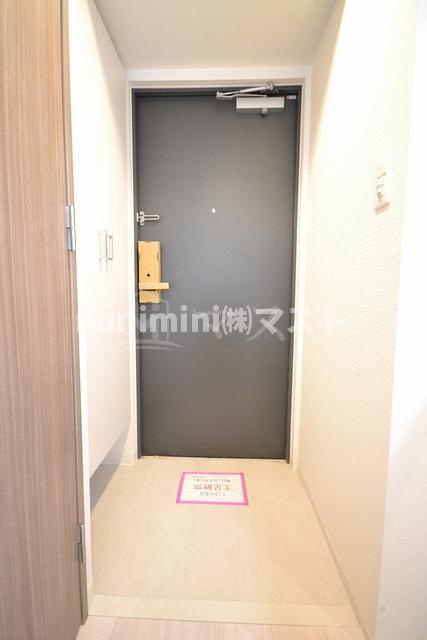 大阪市港区市岡元町２丁目の賃貸マンションの玄関