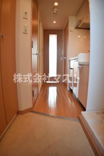 大阪市港区市岡元町１丁目の賃貸マンションの玄関