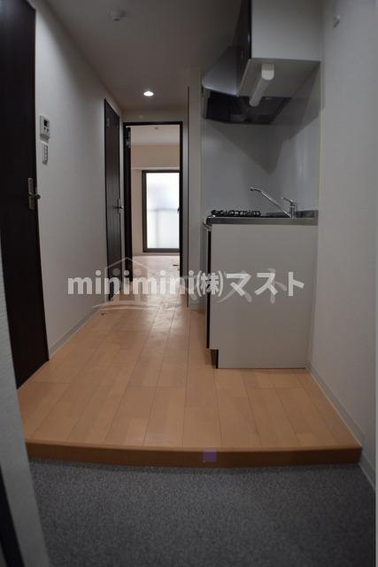 大阪市港区市岡元町２丁目の賃貸マンションの玄関