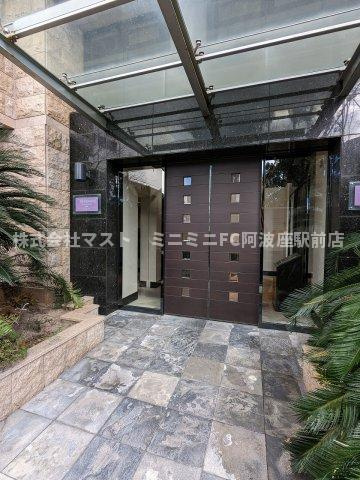 大阪市福島区福島７丁目の賃貸マンションのエントランス