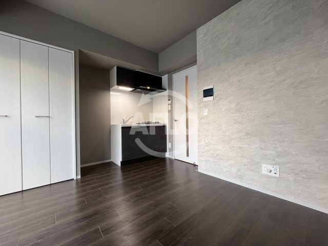 ファーストフィオーレ塚本ウェルビングの寝室|リビング