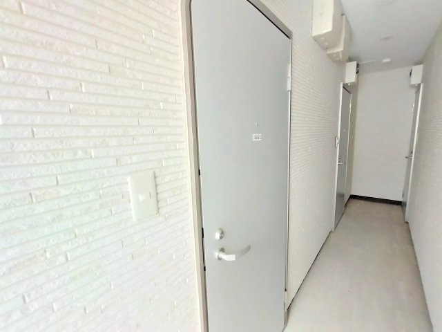AP110 パレス中川II 202（亀有）の玄関|



