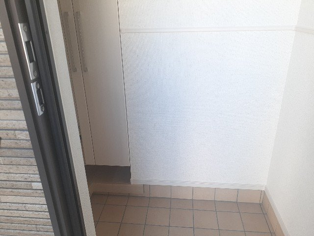 プランドール日比野の玄関
