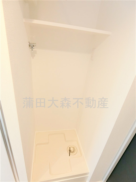 COCOCUBE矢口渡の設備|棚付きの洗濯機置き場