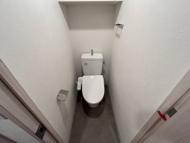 神戸市中央区栄町通７丁目の賃貸マンションのトイレ