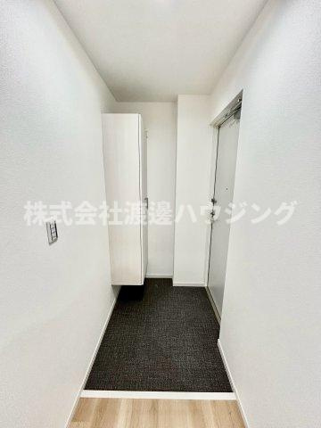 アルカンシェルコート豊津の玄関