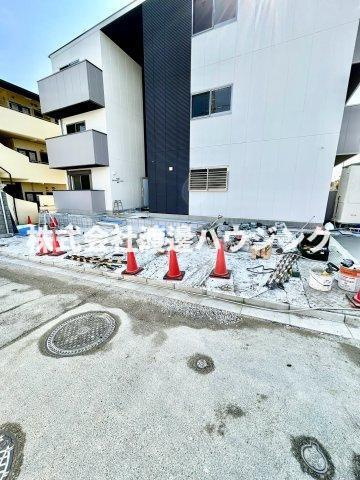 アルカンシェルコート豊津の駐車場