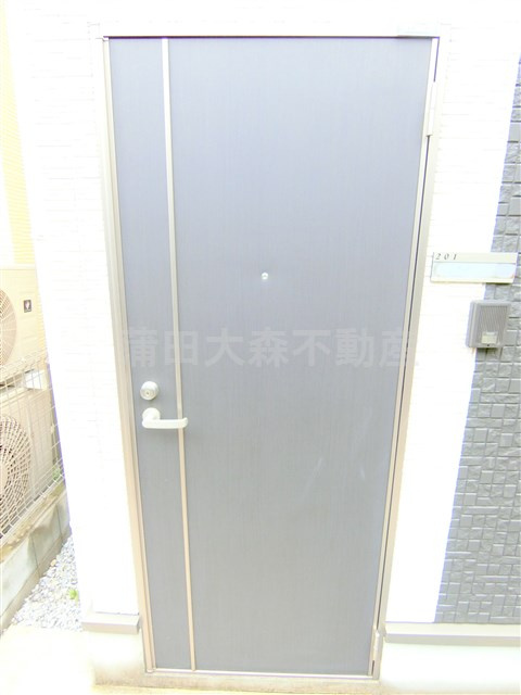 ヴィラ仲六郷の玄関