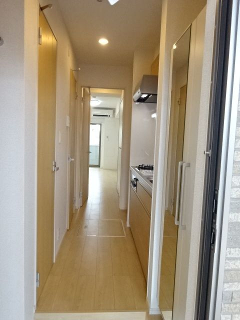 アライブ　ジュネスの玄関