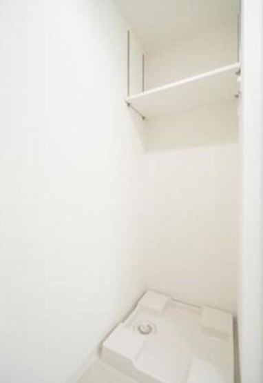 【設備】 | ユニゾンタワー | 室内洗濯機置き場。