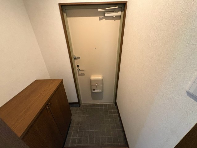 リバーサイド小車3号棟の玄関